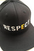 RESPECT Snapback: A black snapback hat with the world RESPECT written across the front in large capitol white letters, and a golden "E."