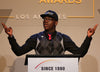 National Student Council leader Terrell (Tj) Mitchell speaks at the GLSEN Respect Awards - Los Angeles, proudly wearing the RESPECT Snapback: A black snapback hat with the world RESPECT written across the front in large capitol white letters, and a golden "E."
